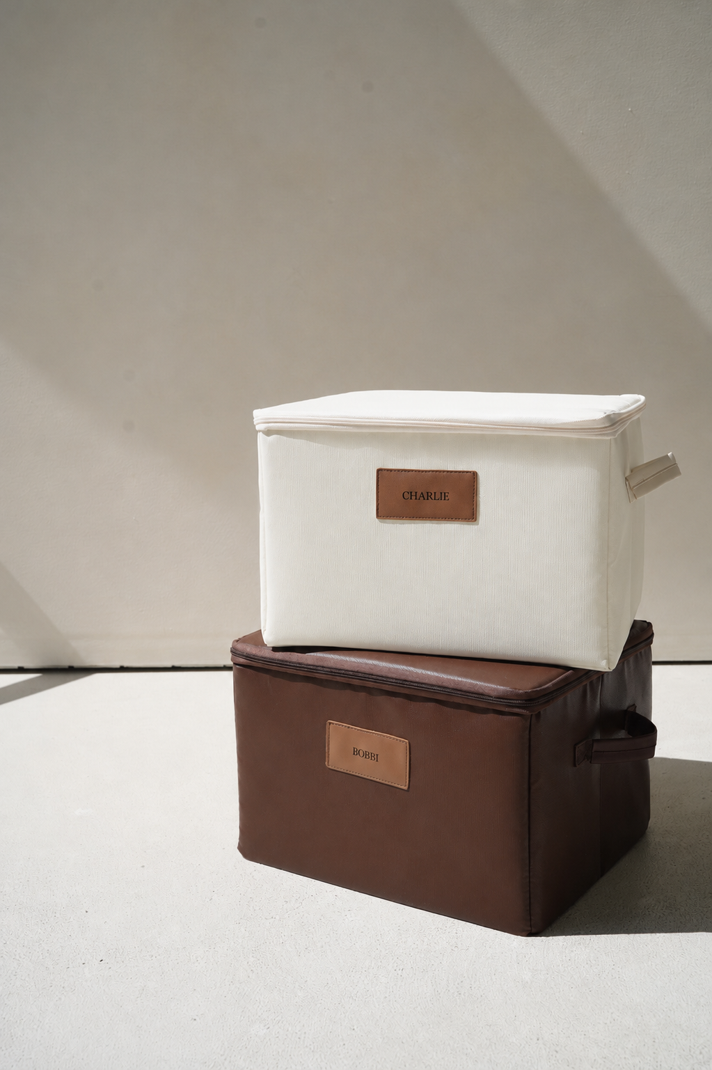 CUBBLI Cream keepsake box stacked on top of a Chocolate keepsake box